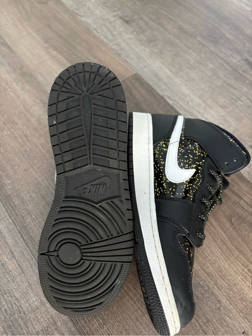 Jordan women’s Black High-Top Sneakers with White Swoosh and Gold Fleck - Picture 6 of 7